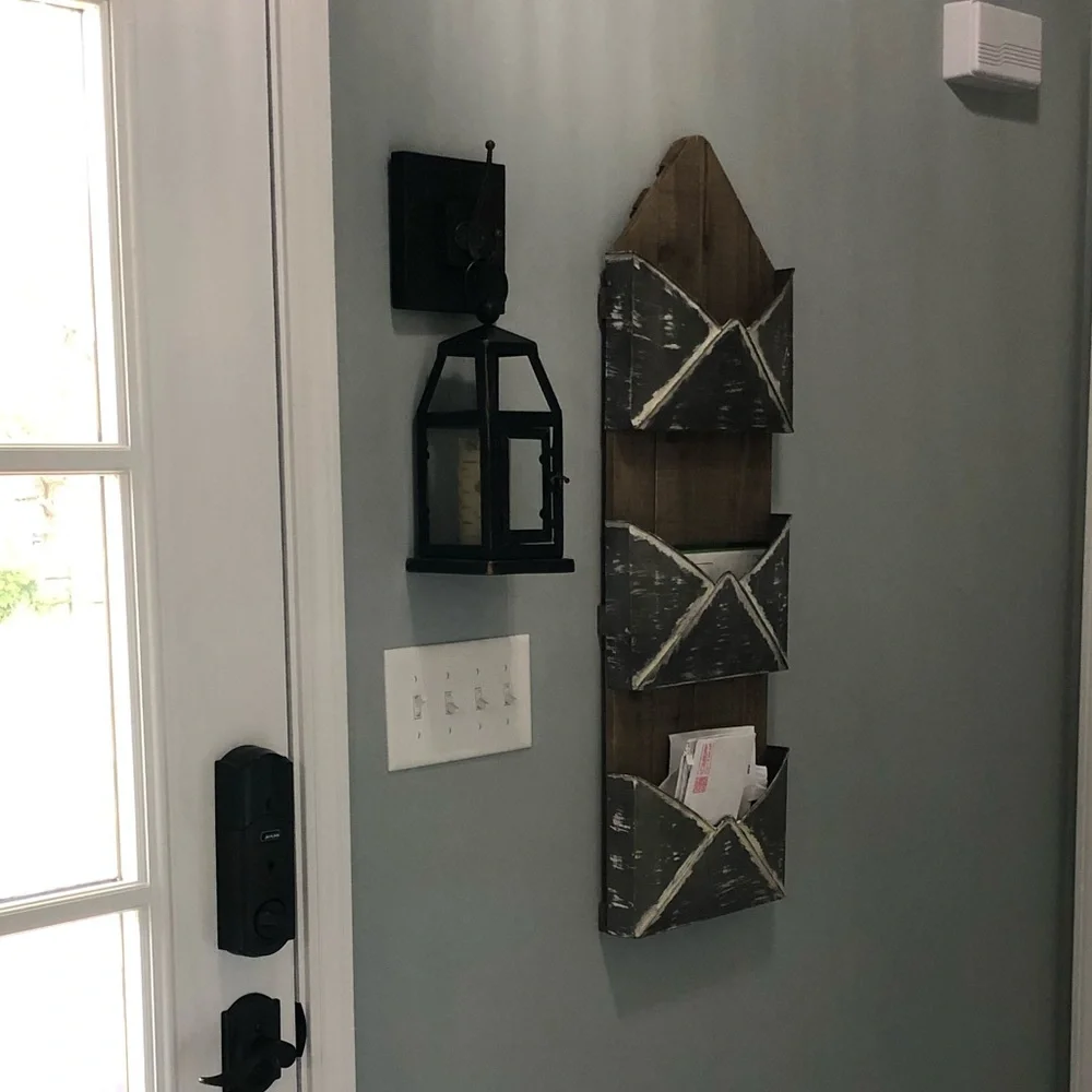 Kirkland’s home wall decor - brass hanging wall lantern.